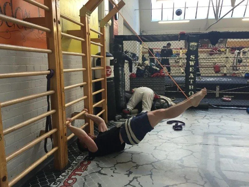 Dragon Flags Exercise Using a Band - Image 2 of 2