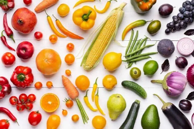 A rainbow coloured selection of fruit and vegetables