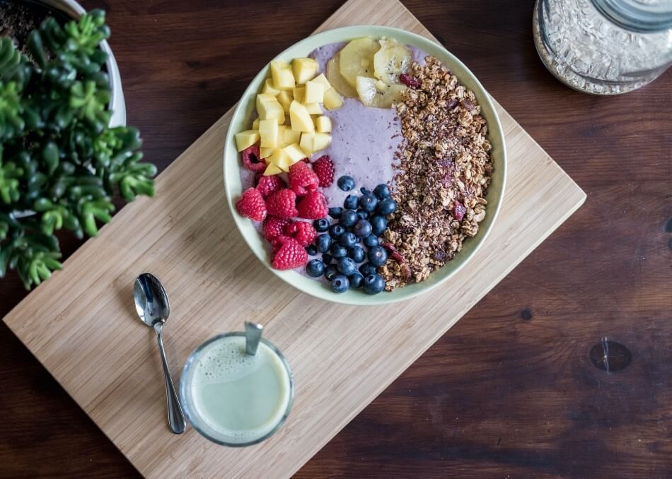 Healthy breakfast displayed on a wooden board