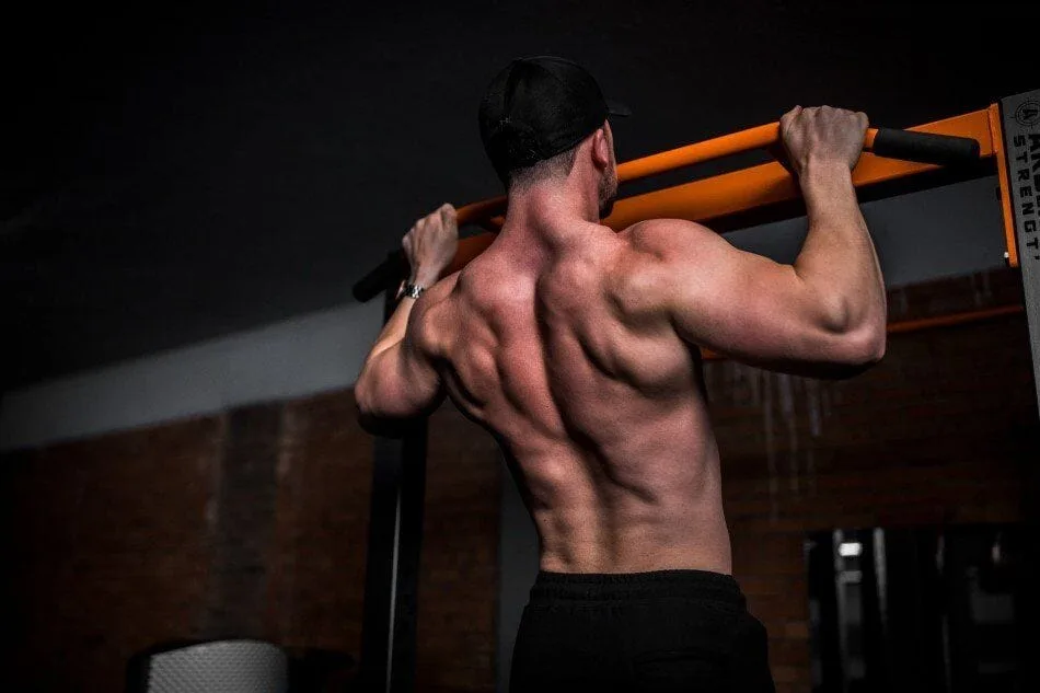 Stock image of a man doing a pull-up