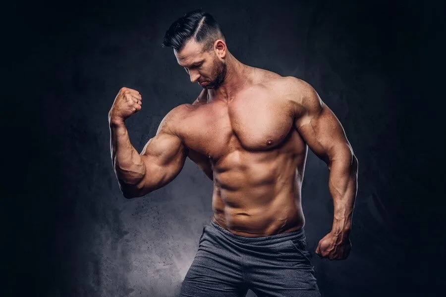 Shirtless male with muscular arms