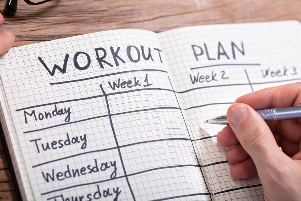 Workout Plan In Checkered Pattern Notebook